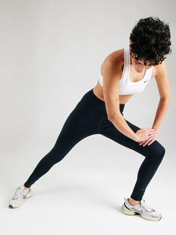 Skinny Pantalon de sport 'Boundless Trek' COLUMBIA en noir