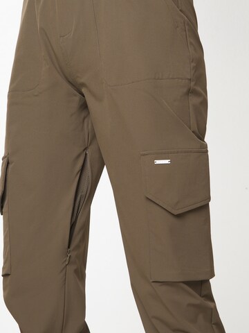 Aim'n Tapered Sporthose in Grün