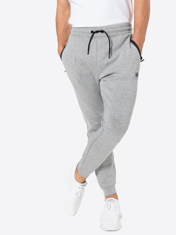 Effilé Pantalon de sport 'Gym' Superdry en gris : devant