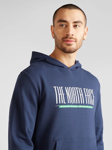 Sweat-shirt 'EST 1966' THE NORTH FACE en bleu