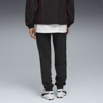 Effilé Pantalon de sport PUMA en noir