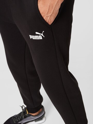 PUMA Tapered Sporthose in Schwarz