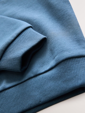 Set Next en bleu