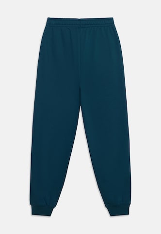 PUMA Tapered Trousers 'Ess No. 1' in Green: front