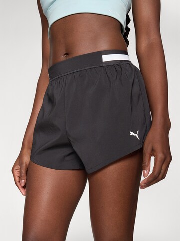 PUMA Regular Sportshorts 'Floral Ribbo' in Schwarz