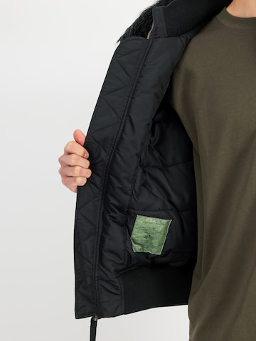 ALPHA INDUSTRIES Between-Season Jacket 'Deflector' in Black: side