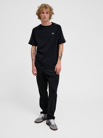Hummel Performance shirt 'ARCHIVE' in Black