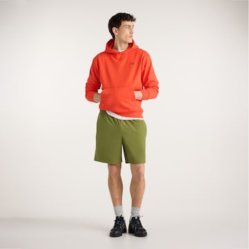 new balance - Loosefit Pantalón 'Athletics Stretch Woven Short 7"' en verde