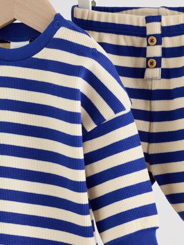 Set de la Next pe albastru