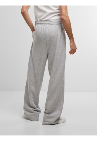 Wide leg Pantaloni di Karl Kani in grigio