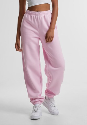 Urban Classics Конический (Tapered) Штаны в Ярко-розовый: спереди