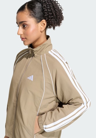 ADIDAS SPORTSWEAR - Casaco de treino 'Iconic' em verde