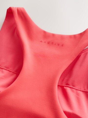 Haut de sport Next en rose