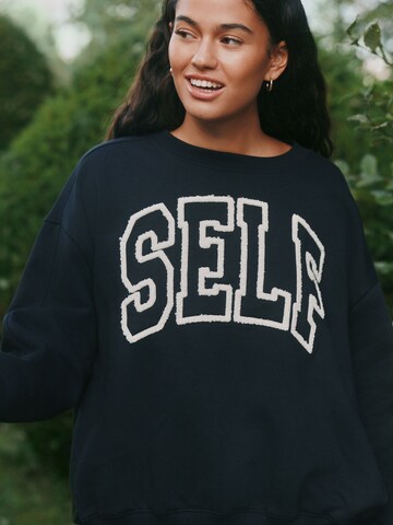 Felpa di self. in nero