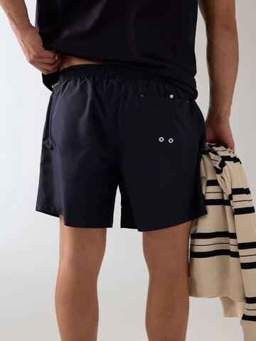 GUESS Board Shorts in Blue
