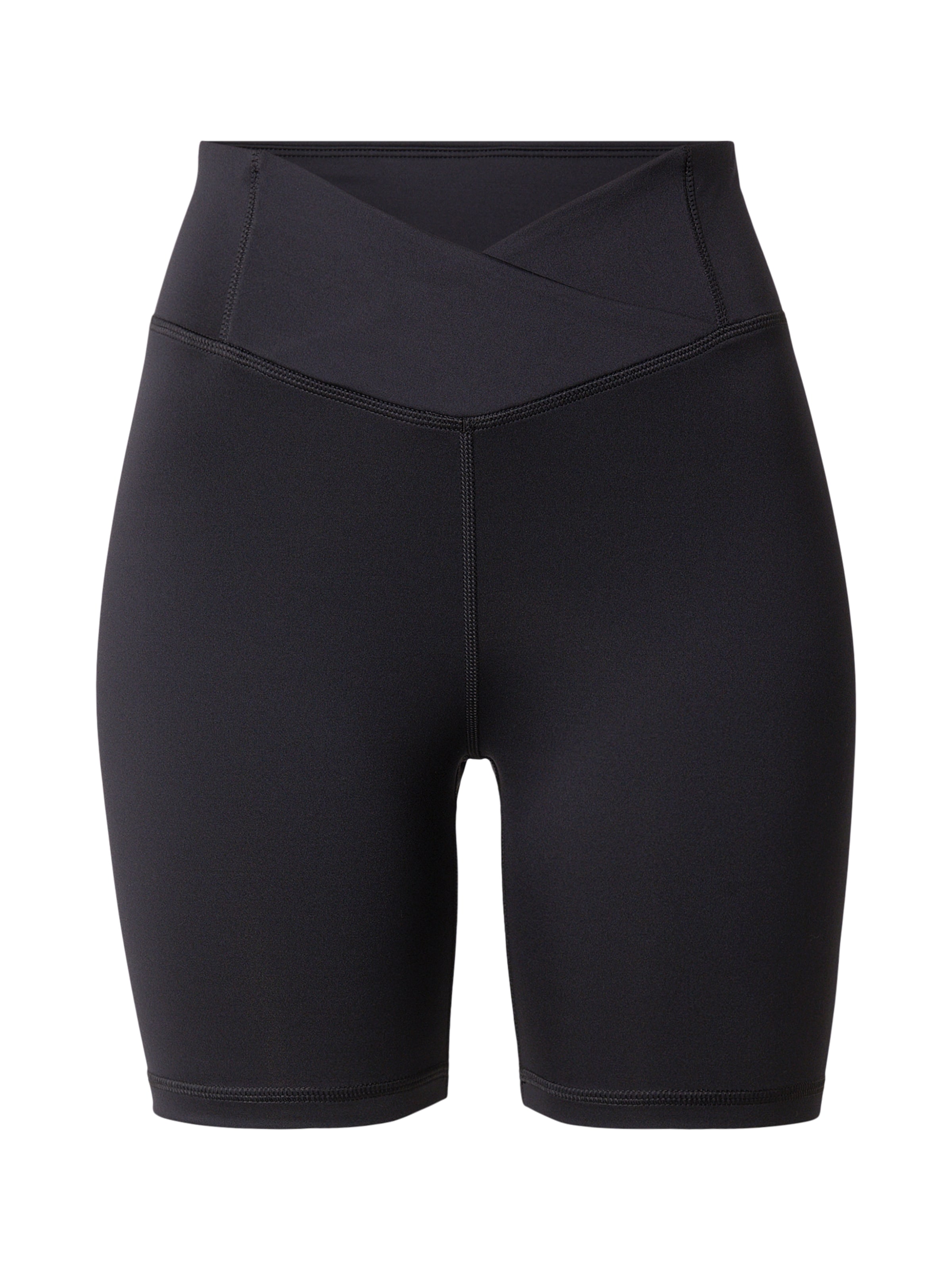 Reebok Skinny Sports trousers in Black: front