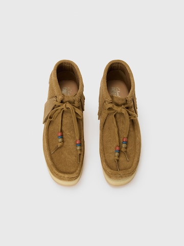Clarks Originals - Botim em castanho