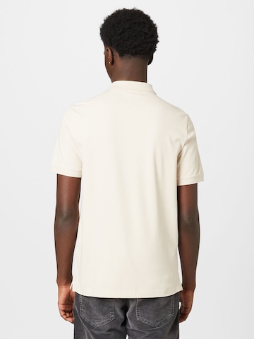 Calvin Klein قميص بلون بيج