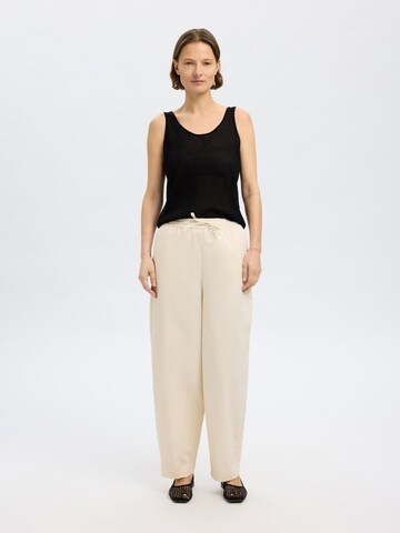 Top in maglia di SELECTED in nero