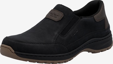 Rieker Slip on -tennarit värissä musta: etupuoli