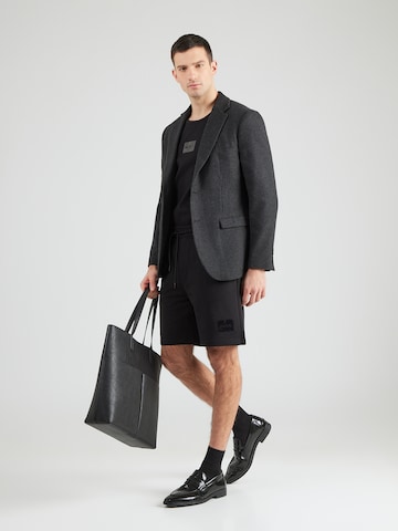 HUGO Loosefit Παντελόνι 'Darix' σε μαύρο