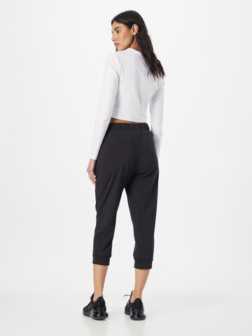 Rukka - Tapered Pantalón deportivo en negro