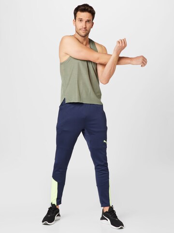 PUMA Slimfit Sportbroek in Blauw