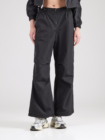 Nike Sportswear - Pierna ancha Pantalón 'Repel' en negro: frente