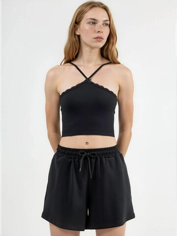 Loosefit Pantaloni di Busem in nero: frontale
