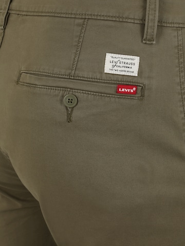 žalia LEVI'S ® Siaurėjantis „Chino“ stiliaus kelnės 'XX Chino Taper Short II'