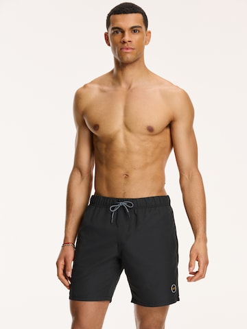 Shorts de bain Shiwi en noir : devant