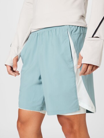 UNDER ARMOUR Regular Sportshorts 'Launch' in Blau