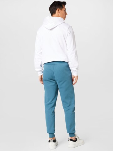 Tapered Pantaloni de la Calvin Klein pe albastru