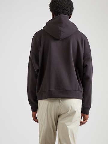 PUMA Majica 'Wardrobe Essentials' | črna barva