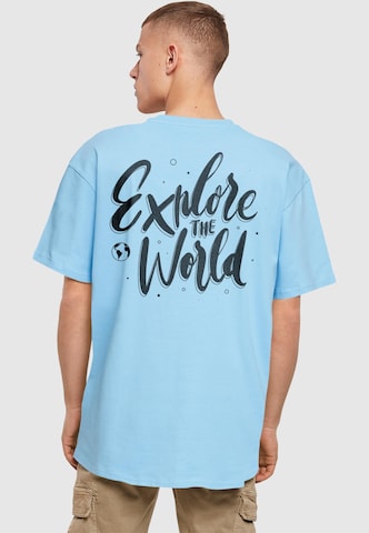 T-Shirt 'Explore The World' Merchcode en bleu