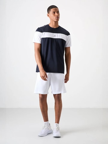 Tommy Life Functioneel shirt in Blauw