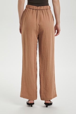 Loosefit Pantaloni 'Camile' di SOAKED IN LUXURY in marrone