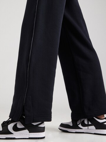 Nike Sportswear Wide leg Trousers 'PHNX FLC' in Black