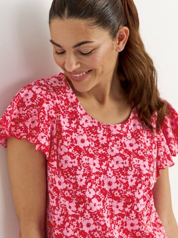 Robe Cellbes of Sweden en rose