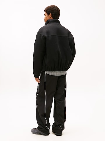 Tommy Jeans Φθινοπωρινό και ανοιξιάτικο μπουφάν 'ESSENTIAL' σε μαύρο