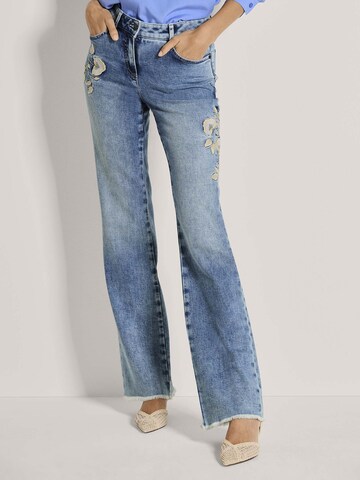 évasé Jean MADELEINE en bleu : devant