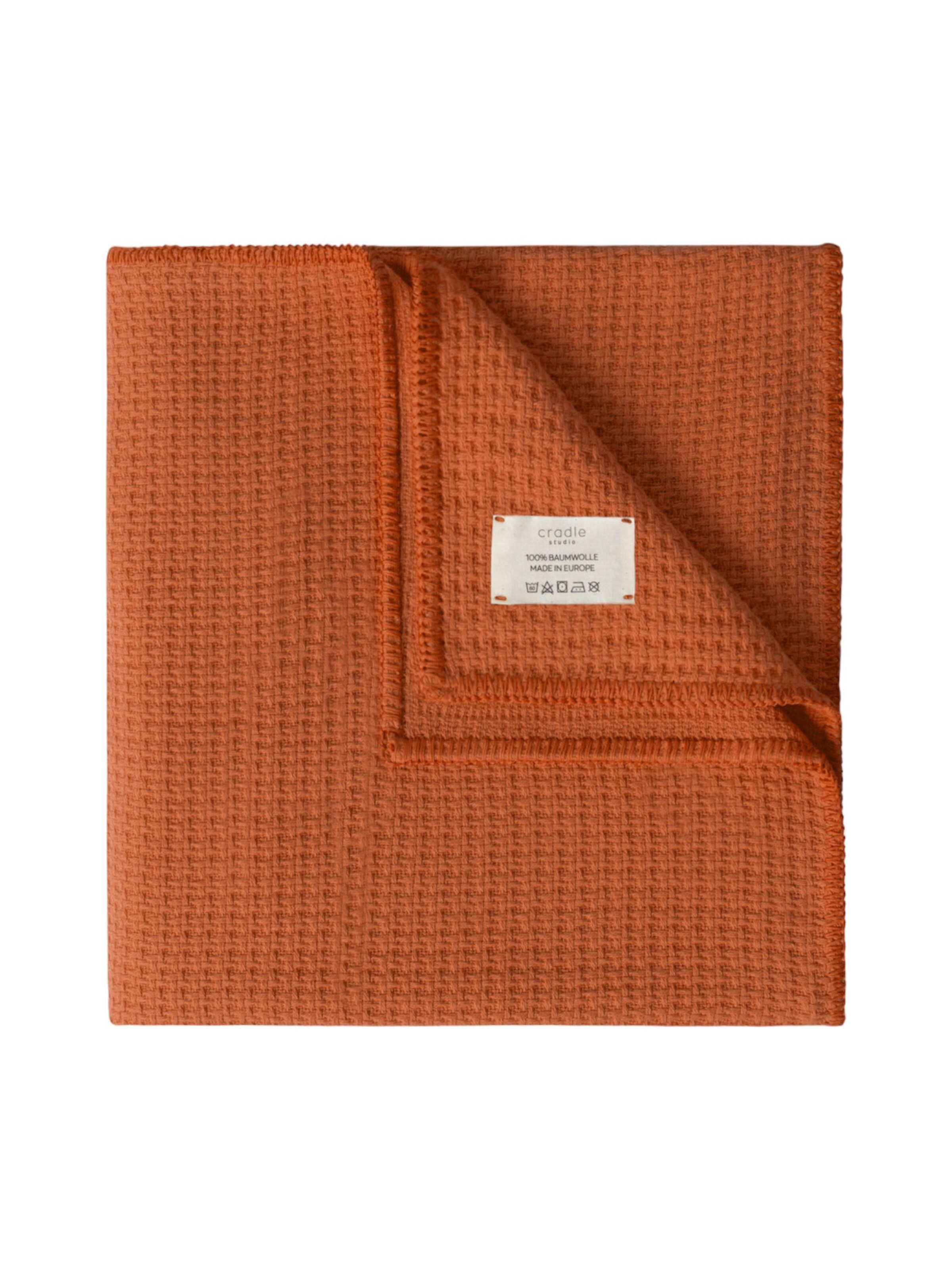 Cradle Studio Blankets in Orange: front