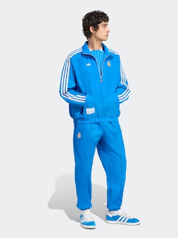 ADIDAS PERFORMANCE - Chaqueta deportiva en azul: frente
