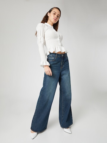 Bella x ABOUT YOU Wide leg Jeans 'Judith' in Blue