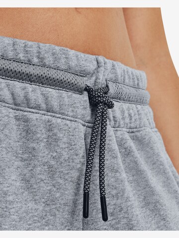 Effilé Pantalon de sport 'Rival' UNDER ARMOUR en gris