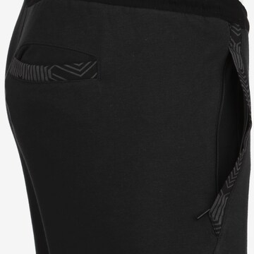 PUMA Tapered Workout Pants 'TeamFinal 21' in Black