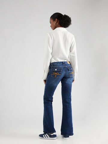 Monki Trudy Low Waisted Flared Jeans in Blue