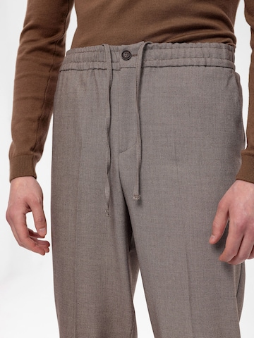 Antioch Tapered Trousers with creases in Beige