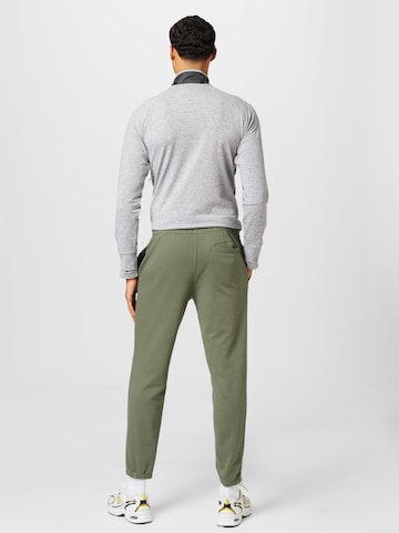 Effilé Pantalon 'Essentials' new balance en vert