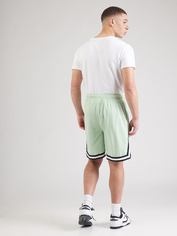 Loosefit Pantalon Karl Kani en vert